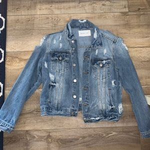 Distressed denim jacket
